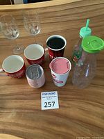 Group shot of mugs, glasses, tumbler and bottles
