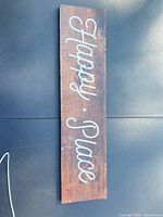 Full view of wood sign showing text