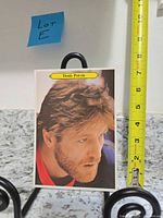 Front view of Denis Potvin jumbo card with tape measure for scale
