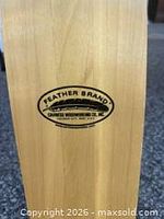 Close-up of Feather Brand decal on paddle blade