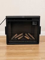 Front view of RealFlame 4199 insert powered off