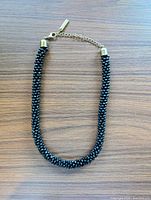Full view of necklace laid flat
