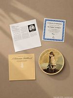 Plate front, COA, leaflet laid out