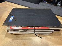 Stack of portfolio and loose prints