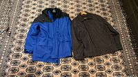 Both jackets side by side on floor