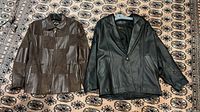 Both jackets laid flat for overall view