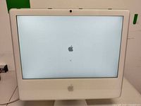 iMac front view booting with Apple logo