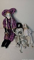 Group view of the three porcelain dolls