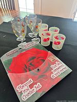 Group shot showing wine goblets, tumblers and packaged Roscan placemat & coaster set