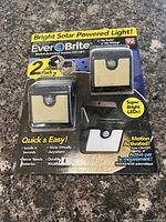 Front of sealed retail package showing two Ever Brite lights and product details