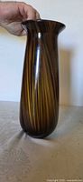 Full side view of vase showing swirl pattern and shape