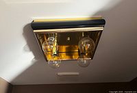 Fixture mounted on ceiling, lights off