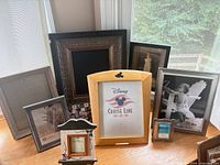 Group shot showing nine assorted frames of various sizes and materials