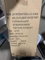 Shipping carton with manufacturer, SKU, color and quantity details