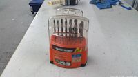 Front view of drill bit set in closed case