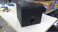 Front and side view of Klipsch ProMedia 2.1 subwoofer