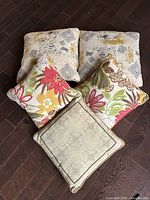 All five cushions arranged on floor