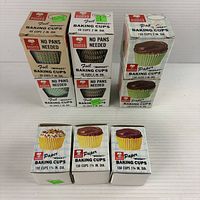 Group shot of all eight Baker's Choice baking cup boxes, paper and foil varieties