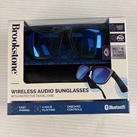 Front view of sealed Brookstone wireless audio sunglasses box