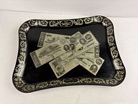 Full view of black and gold metal tole tray