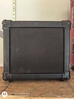 Front view of amplifier showing grille and cabinet
