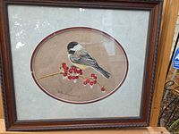 Full view of framed print showing bird, berries, mat and frame