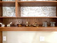 Full shelf view showing all candle holders grouped