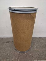 Full view of drum showing fiberboard body and metal rim