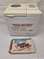 Welbilt bread machine front view with boxed Corning roasting rack