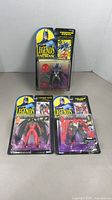 Group view of three sealed Legends of Batman figures