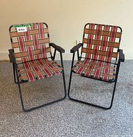 Pair of retro folding webbed lawn chairs