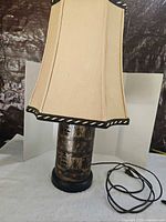 Full view of lamp with shade, cord visible