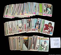 Front view showing stacks of cards with representative fronts, lot reference card visible