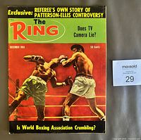 Front cover showing title, date, price, and boxing action image
