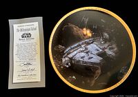 Front of Millennium Falcon plate with Certificate of Authenticity visible