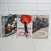 Front covers of all three hardcover graphic novels