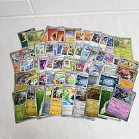 All 60 Pokémon cards spread out face up