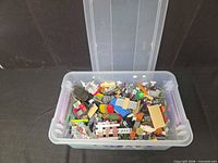 Overall view of container filled with Lego pieces
