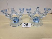Pair of Cambridge Moonlight Blue keyhole candleholders frontal view