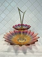 Front view showing both iridescent glass tiers and metal handle