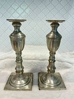 Full view of both silver plated candlesticks