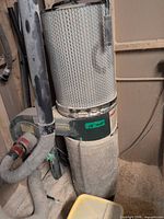 Full view of Craftex CT126 dust collector with cartridge filter, hoses and canister
