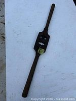 Full view of die handle showing overall length and dual handles