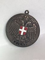 front view with double-headed eagle and enamel shield