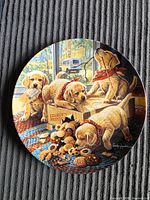 Front view of the plate showing puppy artwork