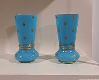 Front view of both blue opaline vases