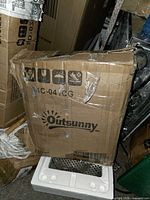 Shipping box marked Outsunny model 94C-04 CG