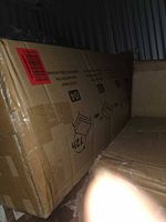 sealed cardboard box containing the unit