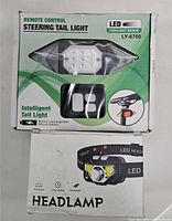 Retail boxes for LY-6700 steering tail light and one headlamp