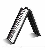 Keyboard folded at hinge showing full keybed